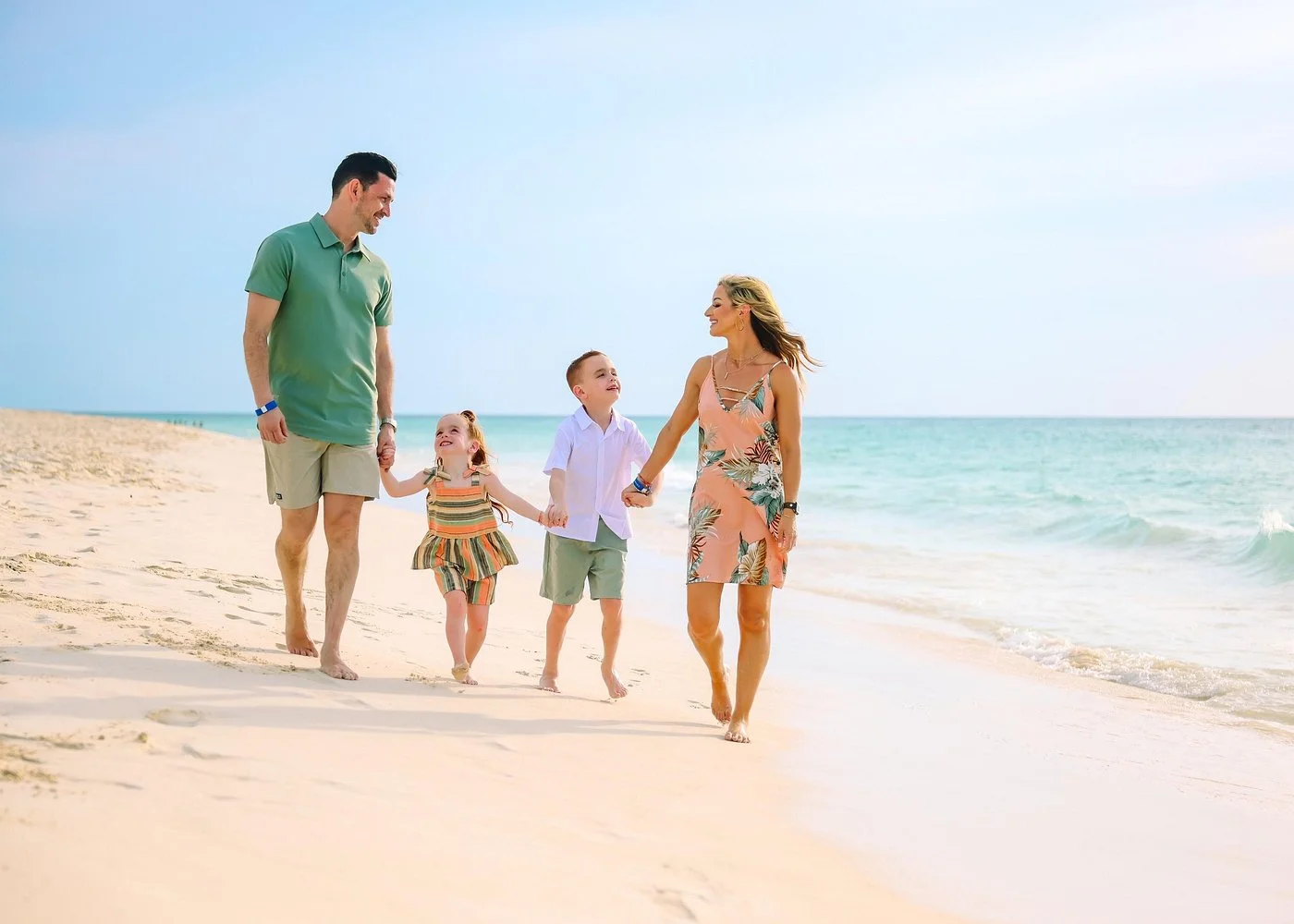 Beach photoshoot outfit guide — white linen at sunset