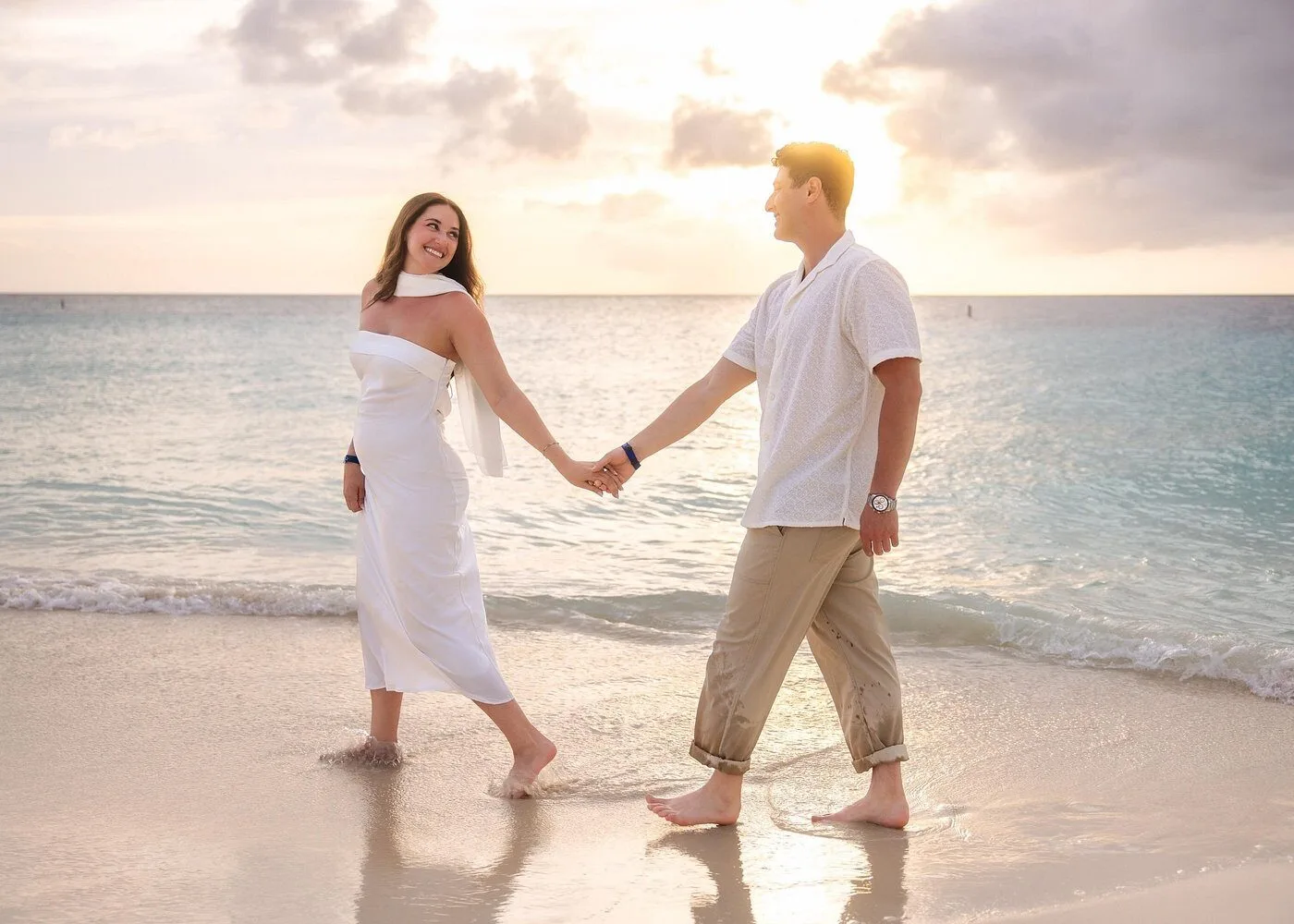 Couple at sunset on Eagle Beach Aruba